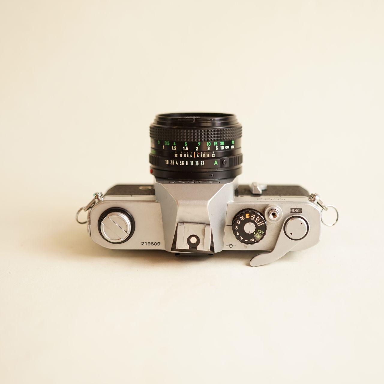 Canon TX 35mm SLR Film Camera with Canon FD 50mm f/1.8 Lens | Tested & Working | Silver & Black