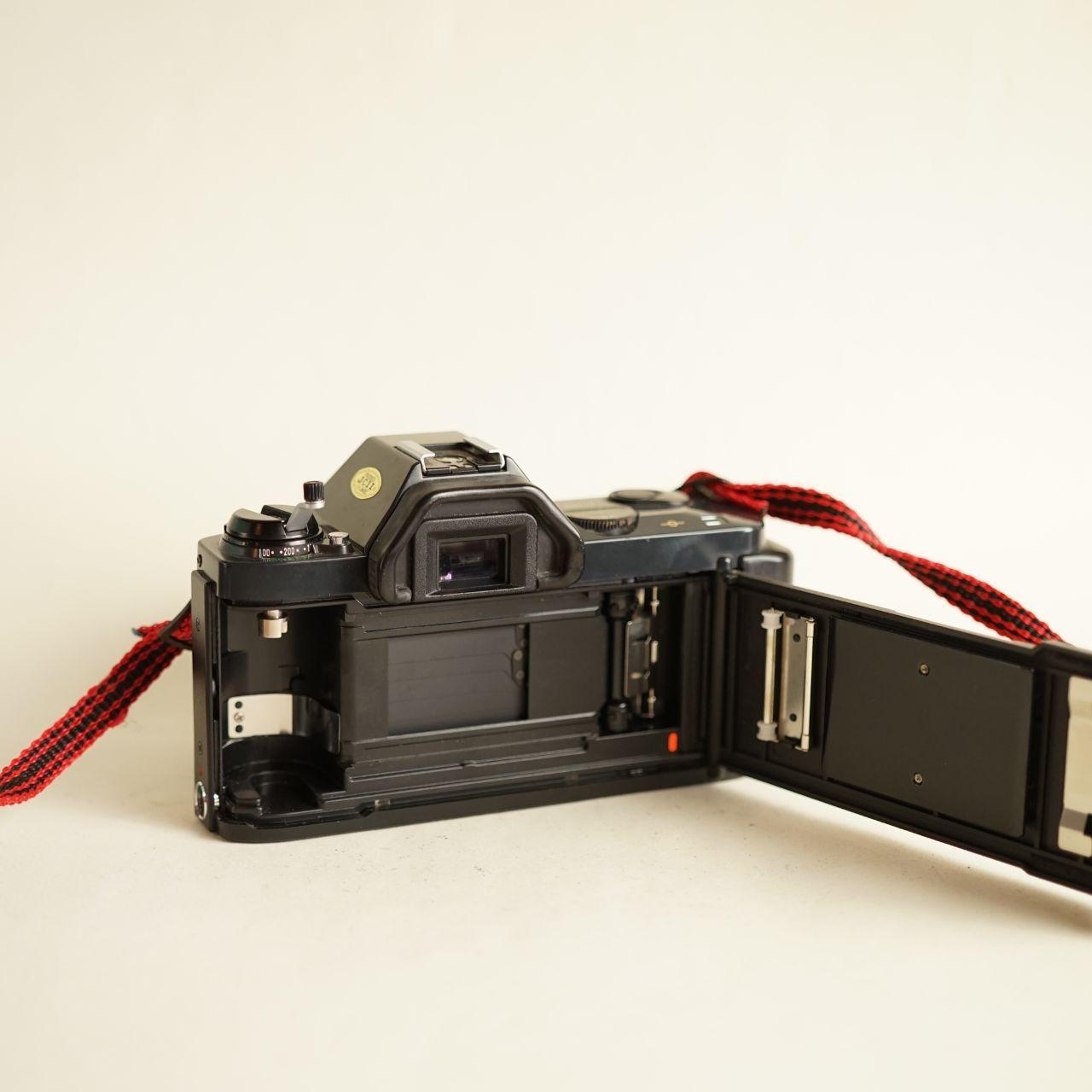 Canon T50 35mm SLR Film Camera w/Canon FD 50mm Lens | Tested & Working | Black