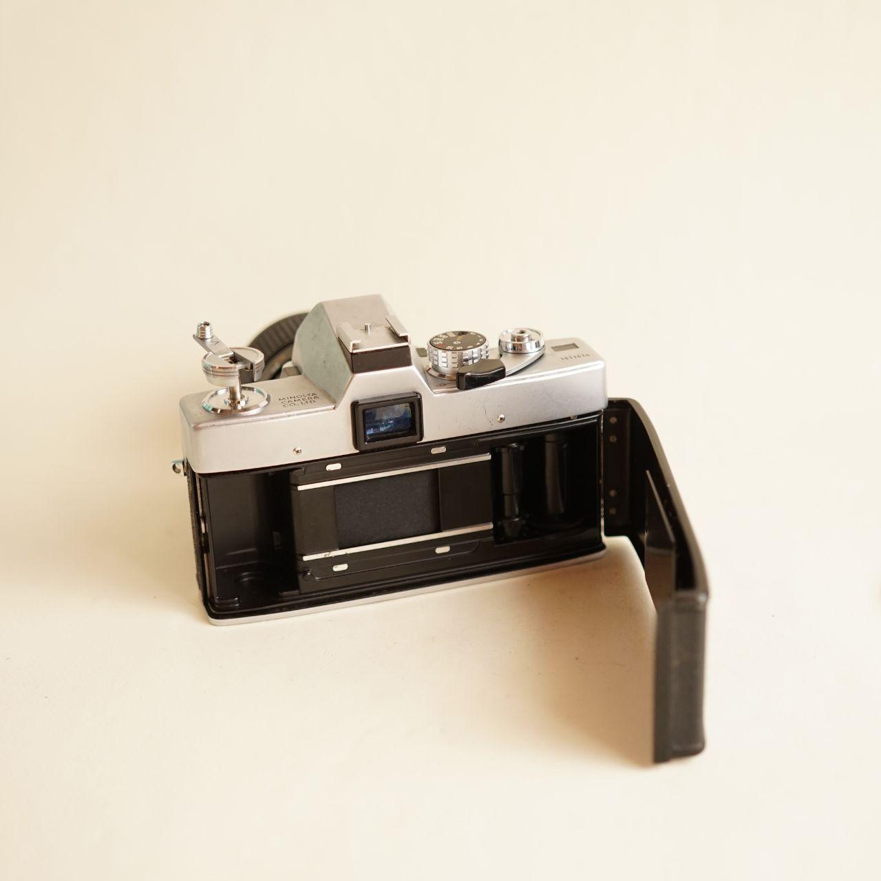 Minolta SRT 101 35mm SLR Film Camera with Minolta MD Zoom 28โ70mm Lens | FULLY CLAโd | Silver & Black