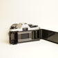 Olympus OM10 35mm Film Camera | Tokina AT-X 28-85mm f/3.5-4.5 Lens | B Condition