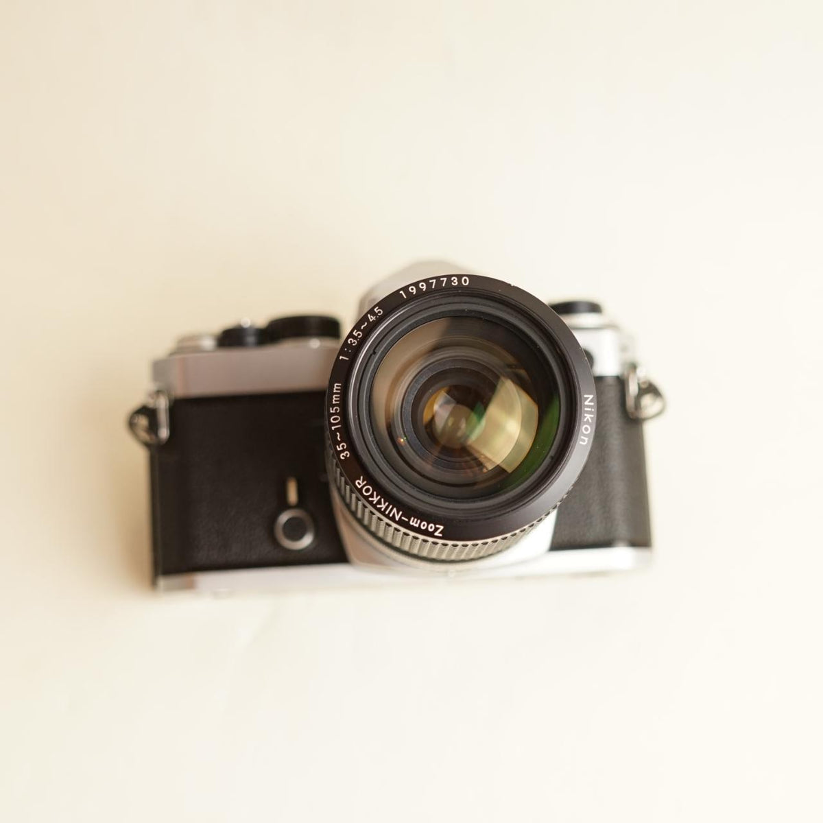 Nikon FE 35mm SLR Film Camera | Nikkor 35–105mm f/3.5–4.5 Lens | Tested & Working | Silver & Black