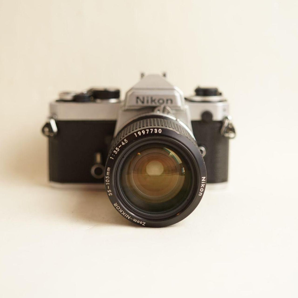 Nikon FE 35mm SLR Film Camera | Nikkor 35–105mm f/3.5–4.5 Lens | Tested & Working | Silver & Black