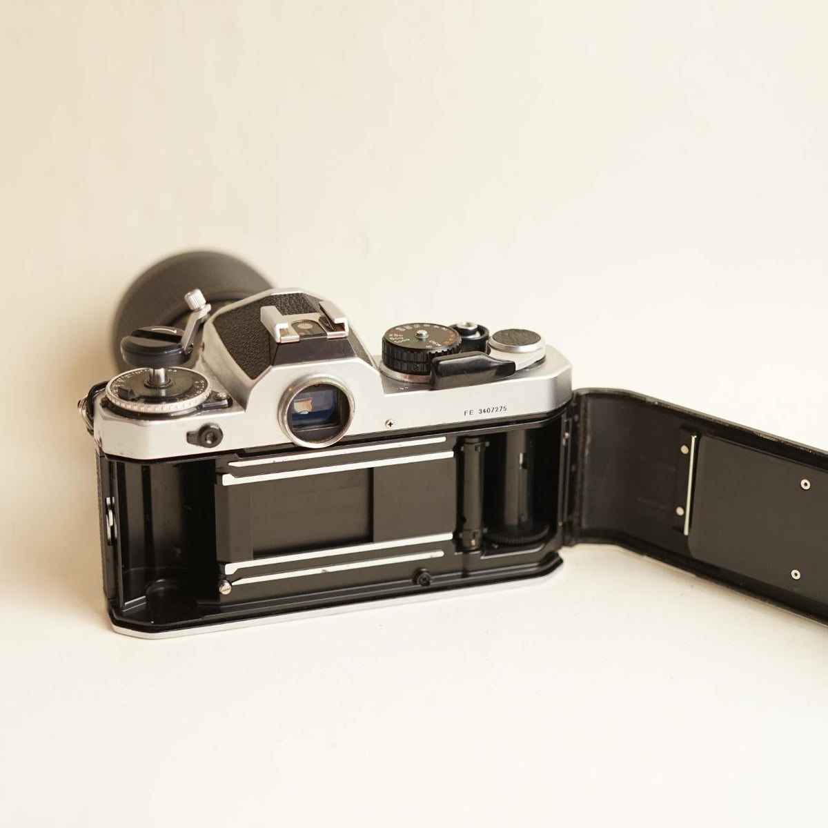 Nikon FE 35mm SLR Film Camera | Nikkor 35–105mm f/3.5–4.5 Lens | Tested & Working | Silver & Black