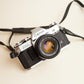 Canon AE-1 Film Camera | 35mm SLR Camera w/ 50mm Lens | Tested & Working | Black & Silver